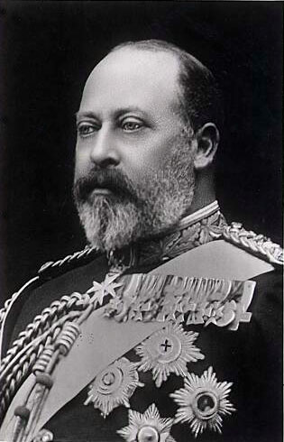 Head and shoulders side on portrait of King Edward the seventh, with moustache and beard, wearing many stars and medals on his chest